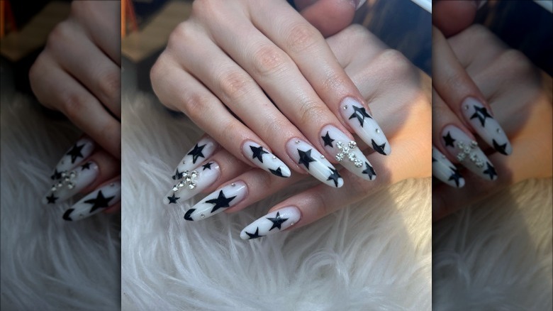 woman with black star nails