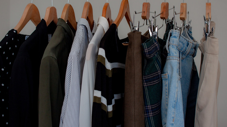 Core outfit staples hanging on a rack