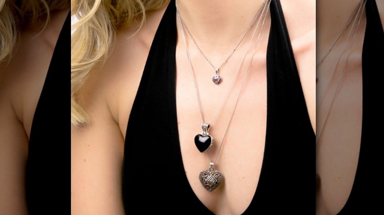 Three necklaces with heart pendants