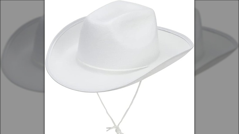 White cowboy hat on white background