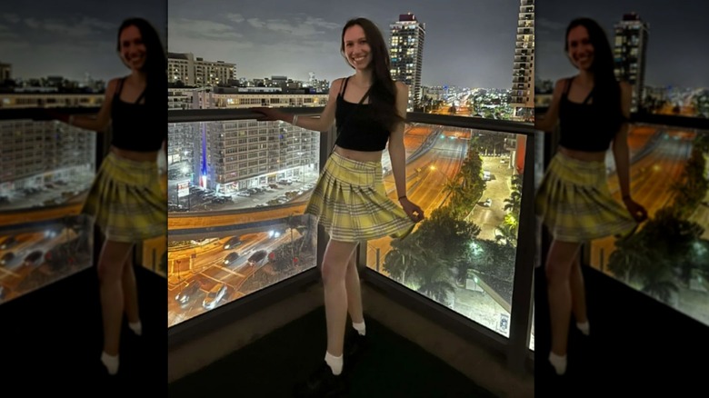 Black crop top and yellow miniskirt