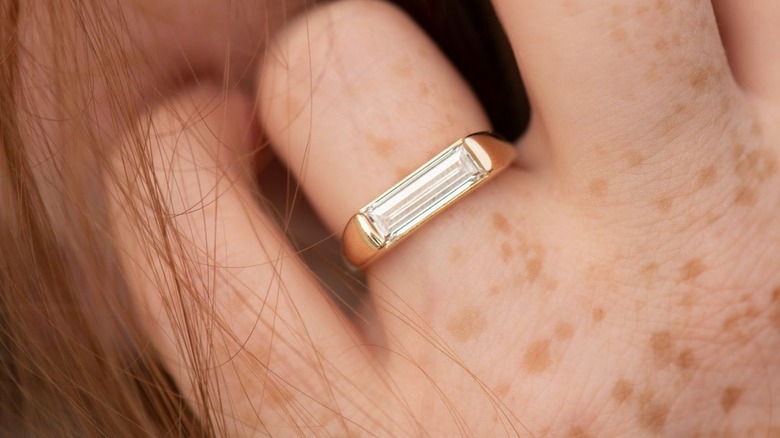 woman with baguette ring