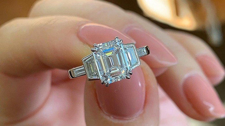 woman with rectangle step-cut diamond