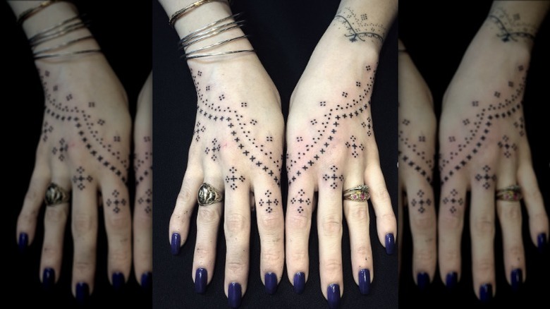 geometric hand tattoo