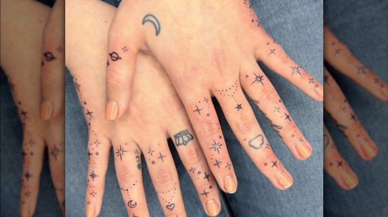 hand tattoos with stars