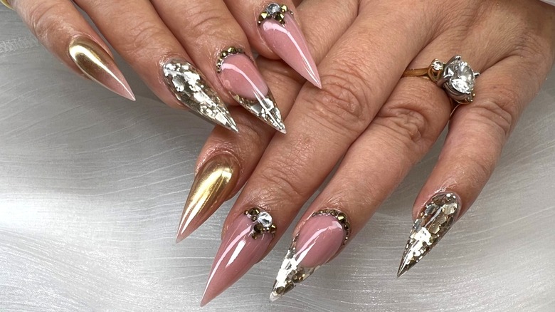 Pink and gold stiletto manicure