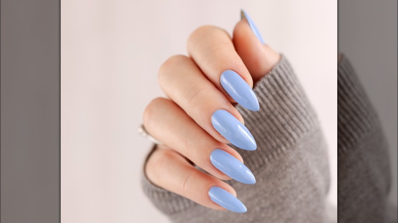 Sky blue stiletto nails manicure