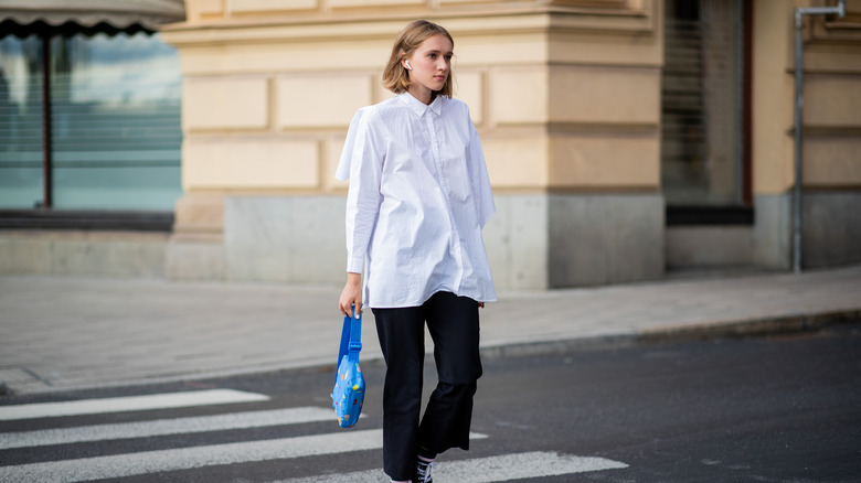 woman wearing white button-up