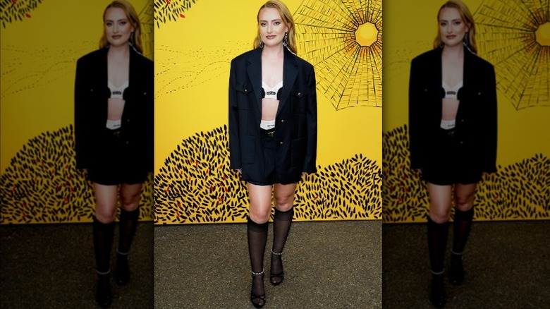 Black blazer and skirt with stockings