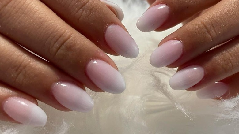 Pale pink semi-opaque nails 