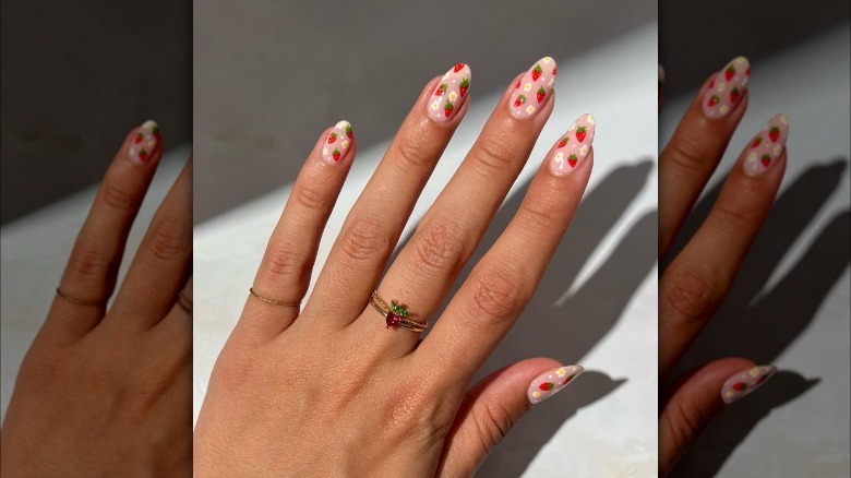 Strawberry and daisy nails