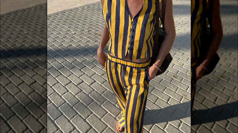 woman wearing yellow and blue striped set