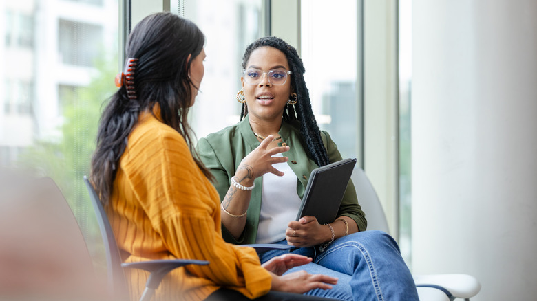 woman speaking to therapist