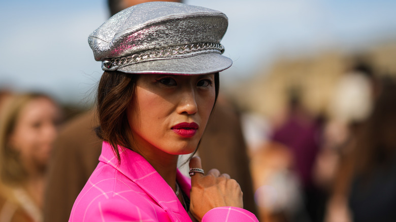 Woman in neon pink jacket