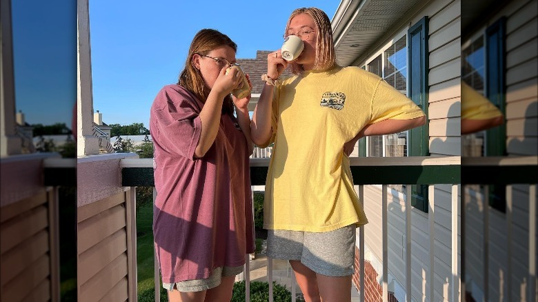 Two women wearing baggy clothes