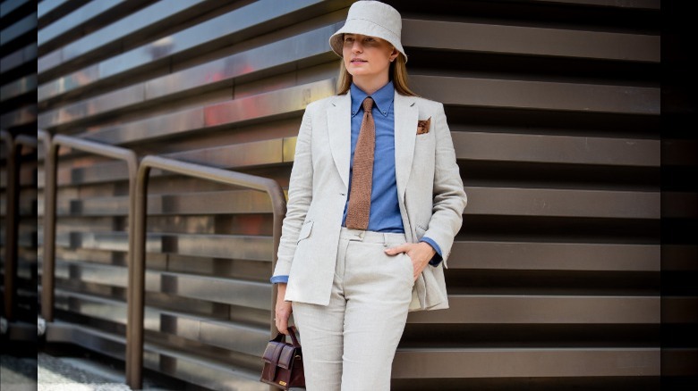 Monika Kaminska wearing linen suit, tie