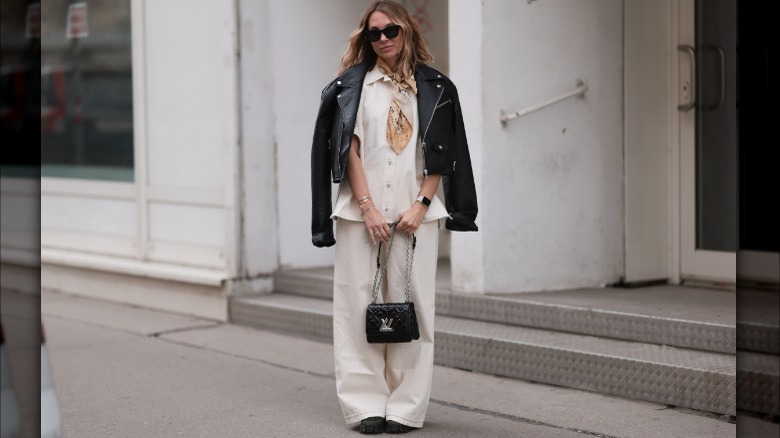 Karin Teigl wearing linen pants, button-down