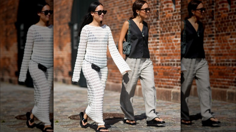 Woman wearing linen pants, black top