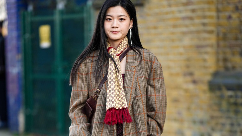 printed tassel scarf with oversized plaid blazer