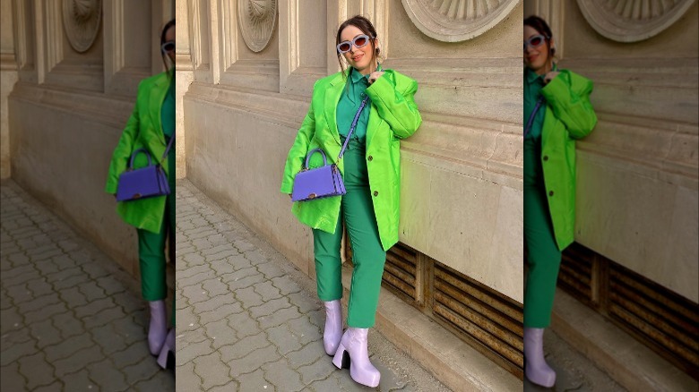 women wearing green tonal outfit 