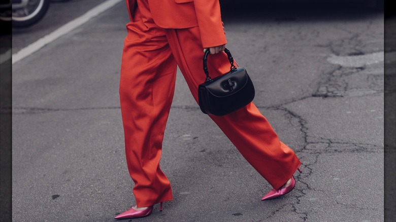 Person wearing rose-gold heels