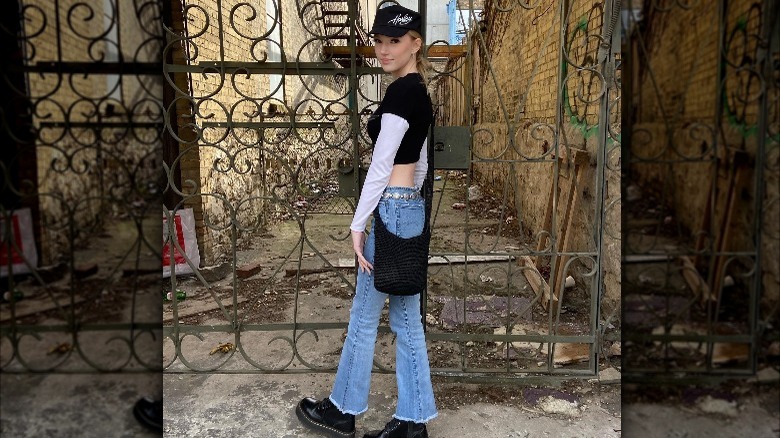 Girl wearing chain belt with low-rise denim