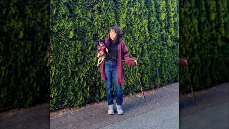 Woman wearing cardigan over jeans