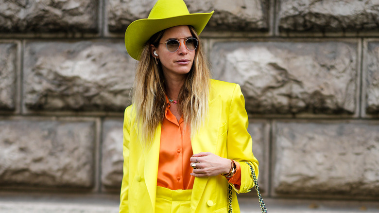 woman in suit and fedora