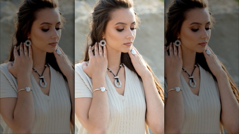 woman wearing silver jewelry