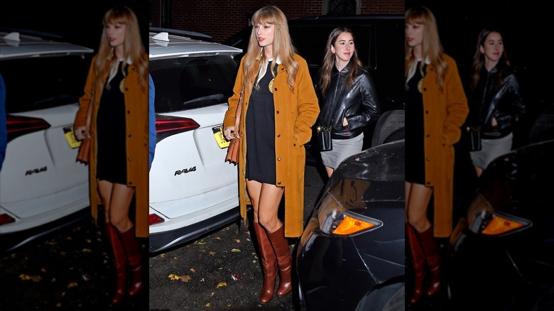 Taylor Swift wearing minidress and long coat