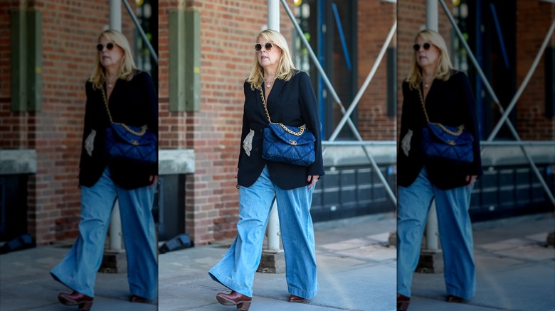 Woman in baggy jeans