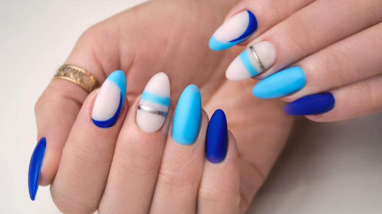 Geometric blue-and-white manicure