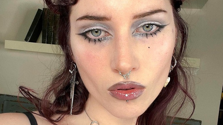 Alt woman with shimmery makeup