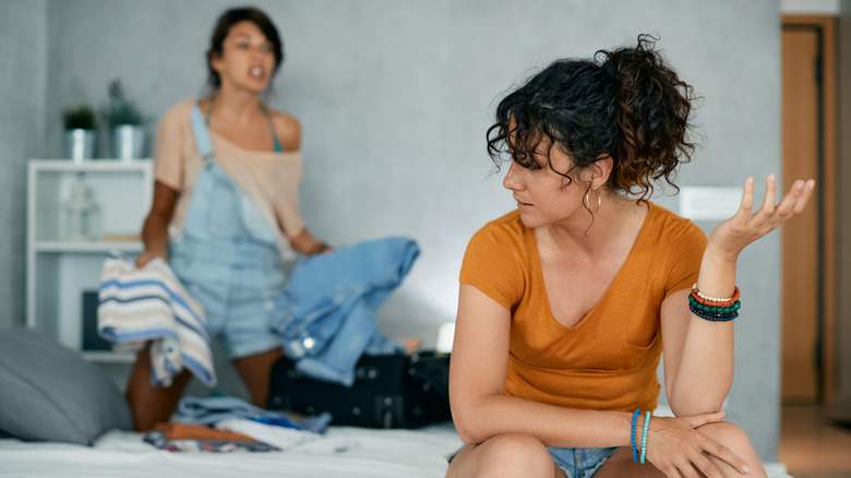 Women fighting while doing laundry 