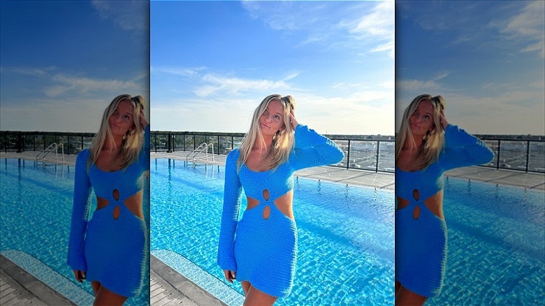 woman wearing blue cutout dress