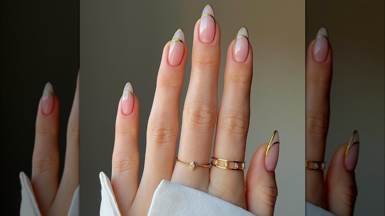 Gold outline French tips manicure