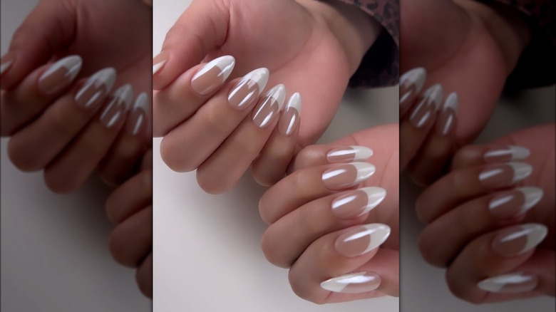 Pearly stiletto French tips manicure