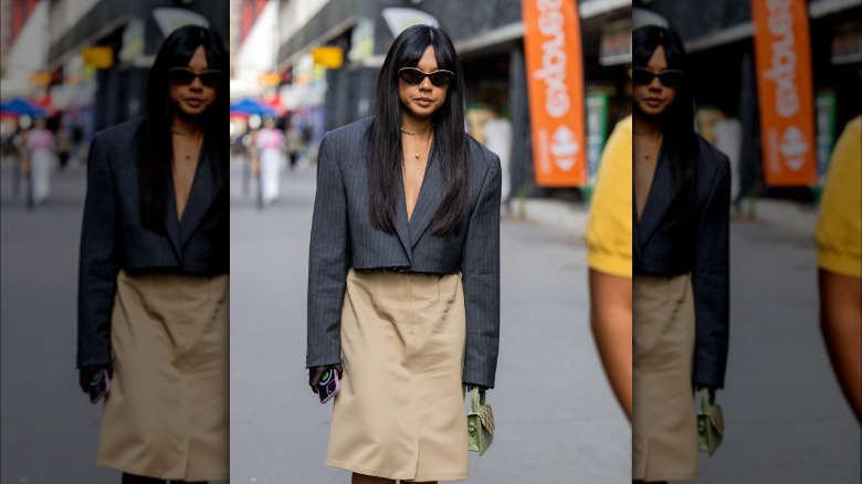 woman with striped cropped blazer