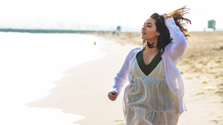 Woman with long hair at the beach