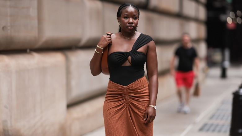 woman in maxi skirt