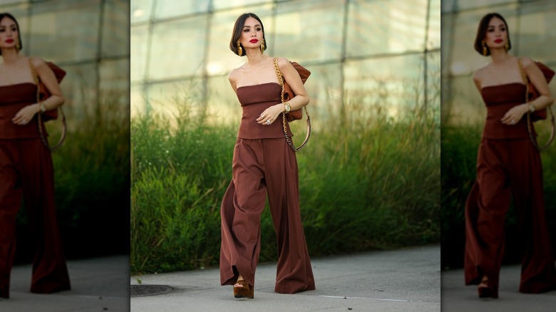 woman in palazzo trousers