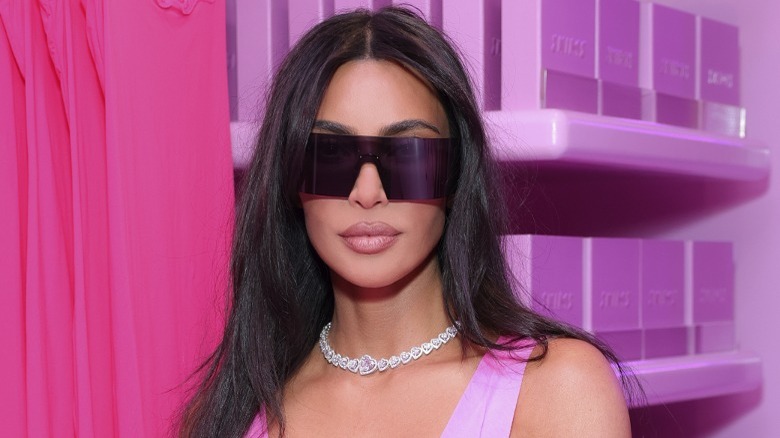 Kim Kardashian in visor sunglasses