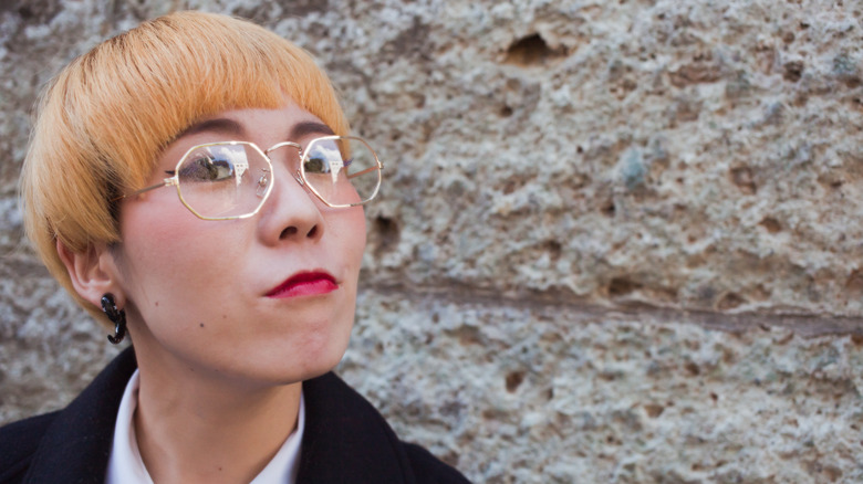 Woman with brassy orange hair 