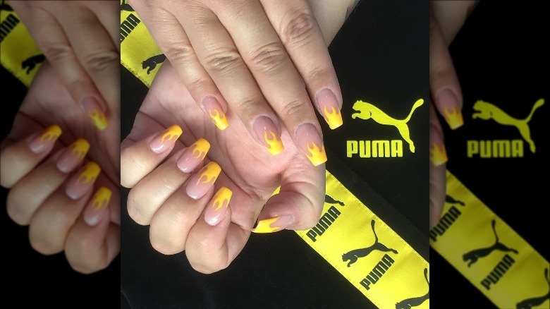 nails with yellow flame design