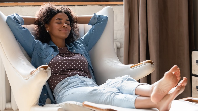 Woman relaxing with feet up