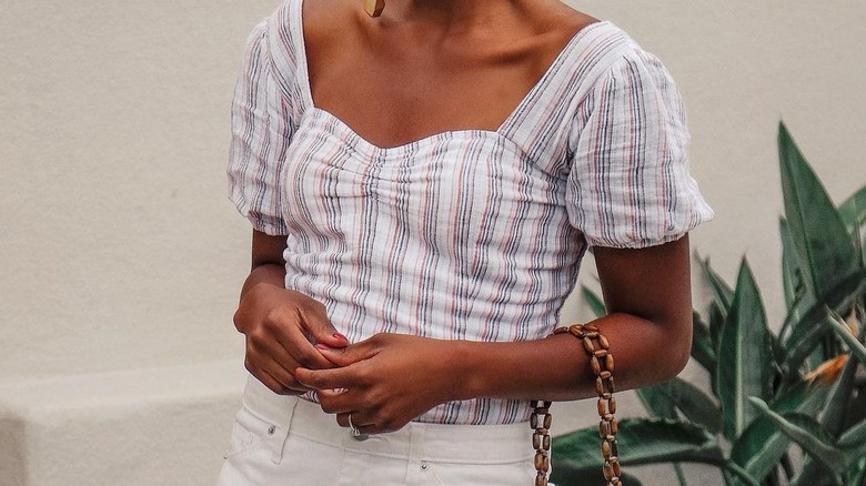 Woman wearing striped top