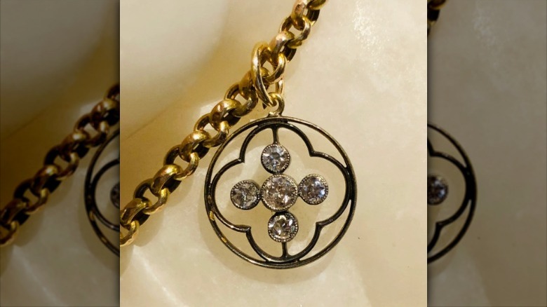 close up of black gold/diamond jewelry