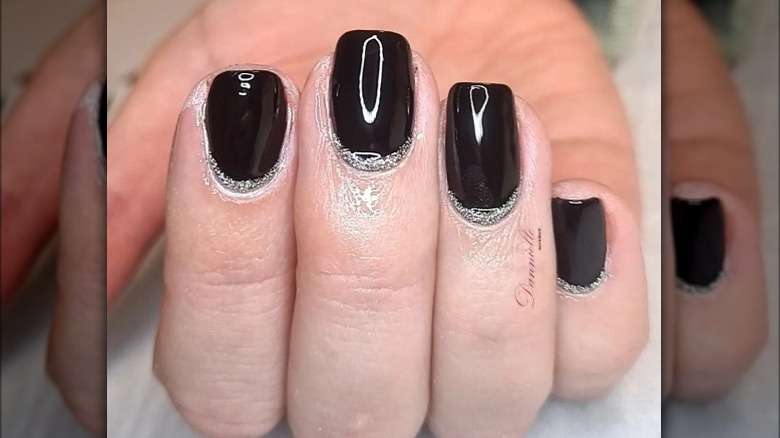 Black and silver reverse French manicure