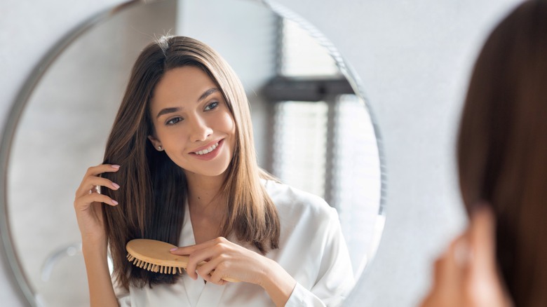 Woman brushing her hair