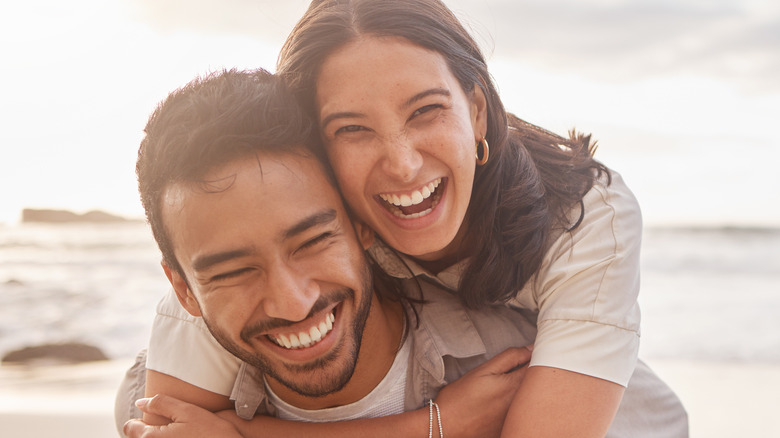 smiling couple on beach